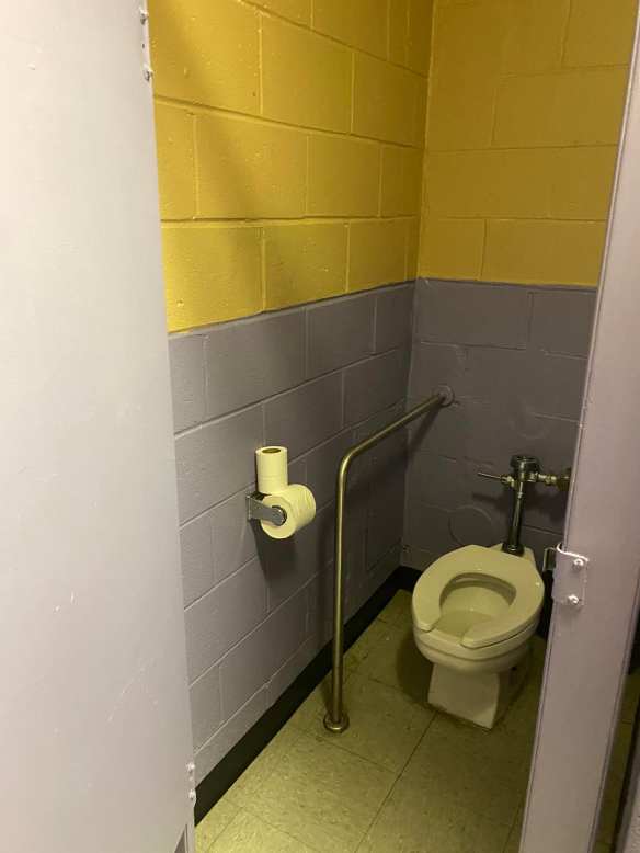 toilet stalls are re-fitted with bars for accessibility