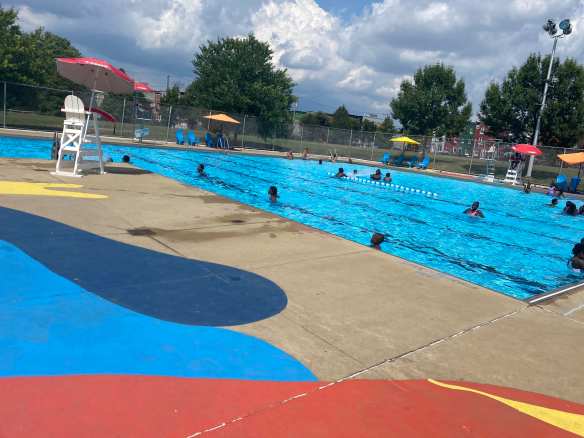 Photo of full MLK pool from behind the fence on Julu 17, they day before they plan to open