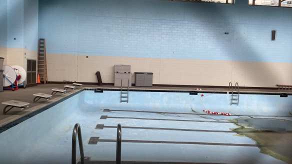 Empty pool with lap lines through window
